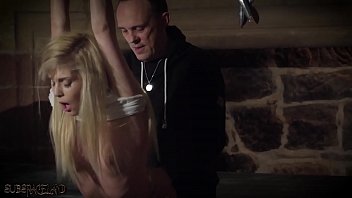A hot chick gets her tits tied up with ropes in a brutal S&M session